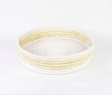 Round woven tray made from seagrass