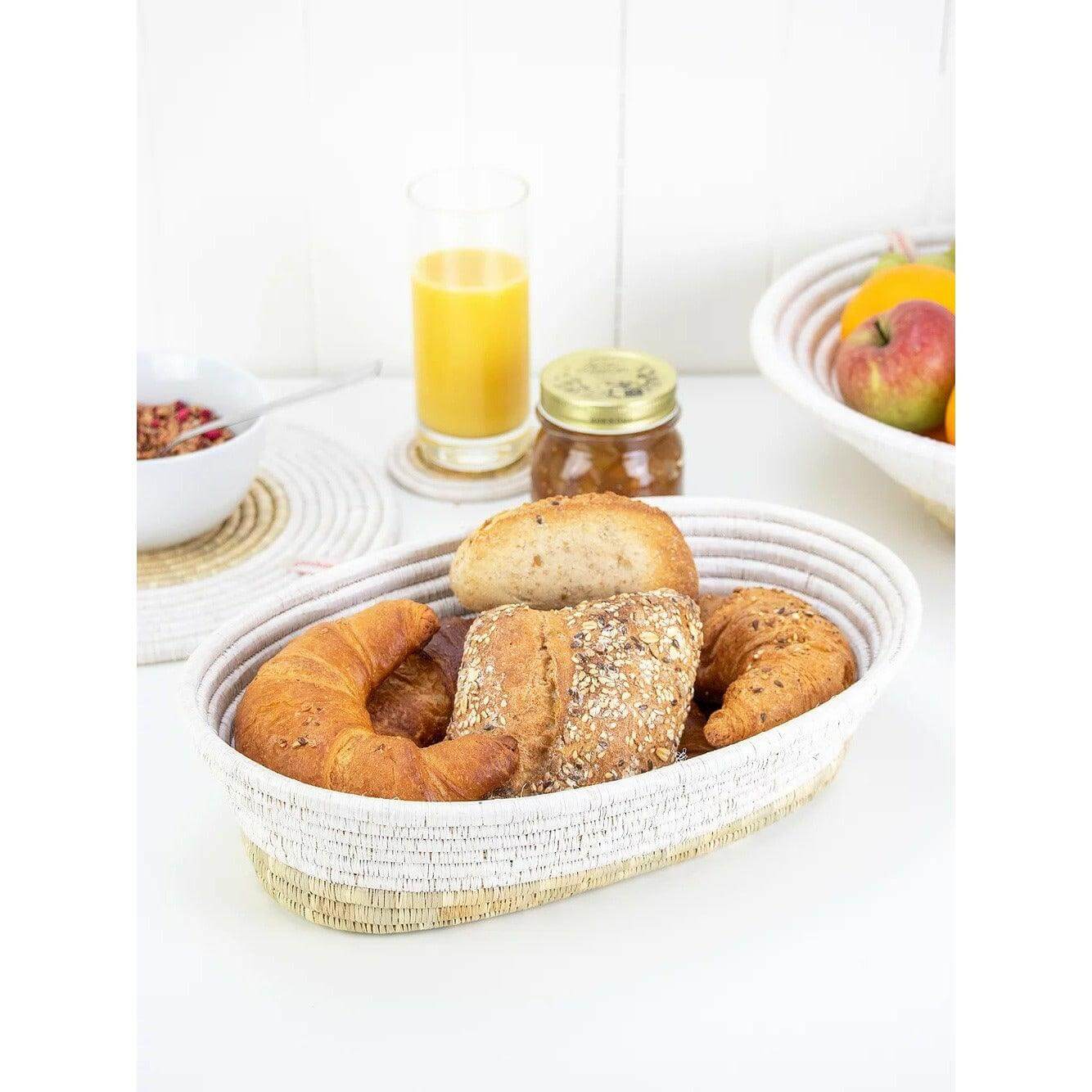 Artisan handmade woven bread basket with bread