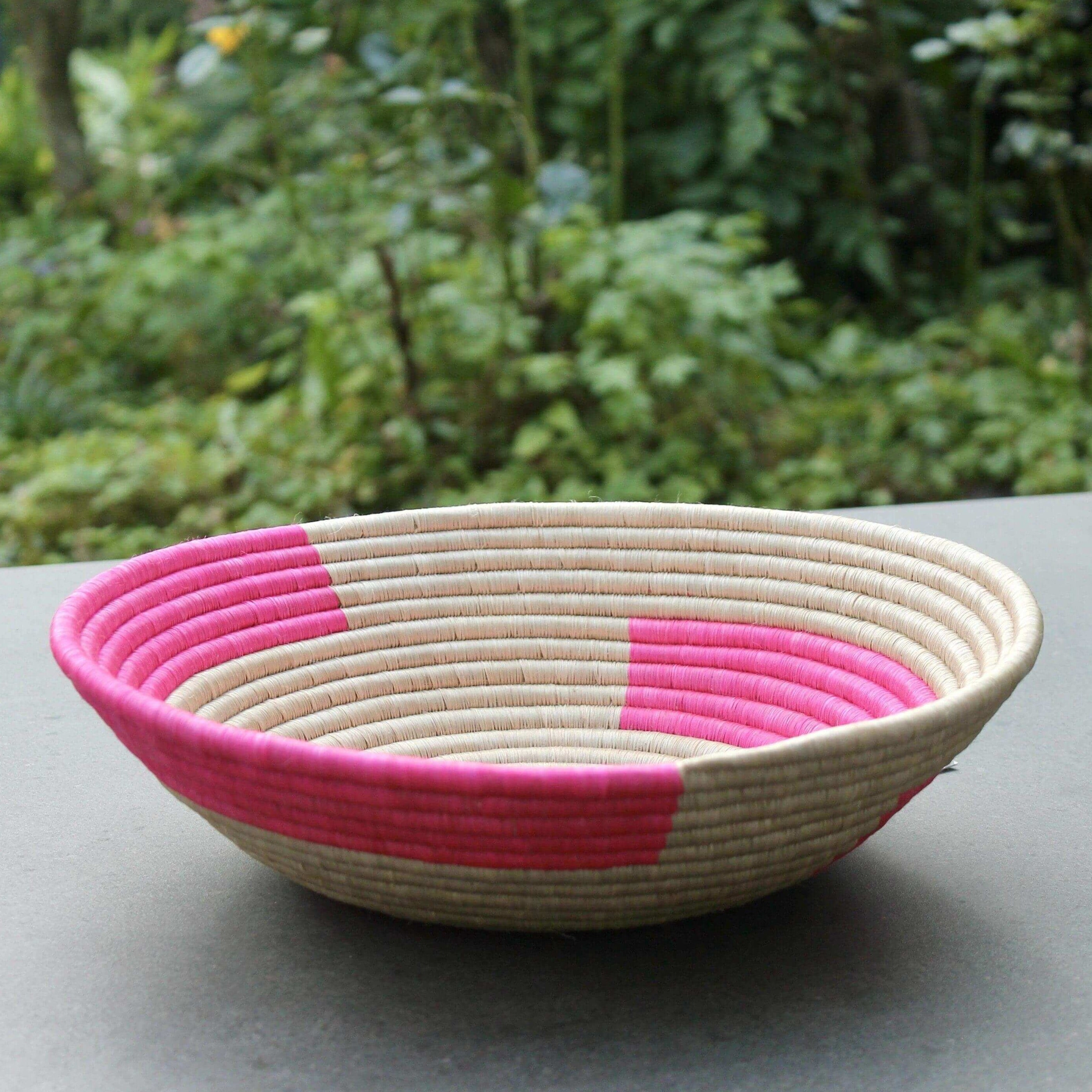 Ethically handmade pink and natural seagrass fruit bowl
