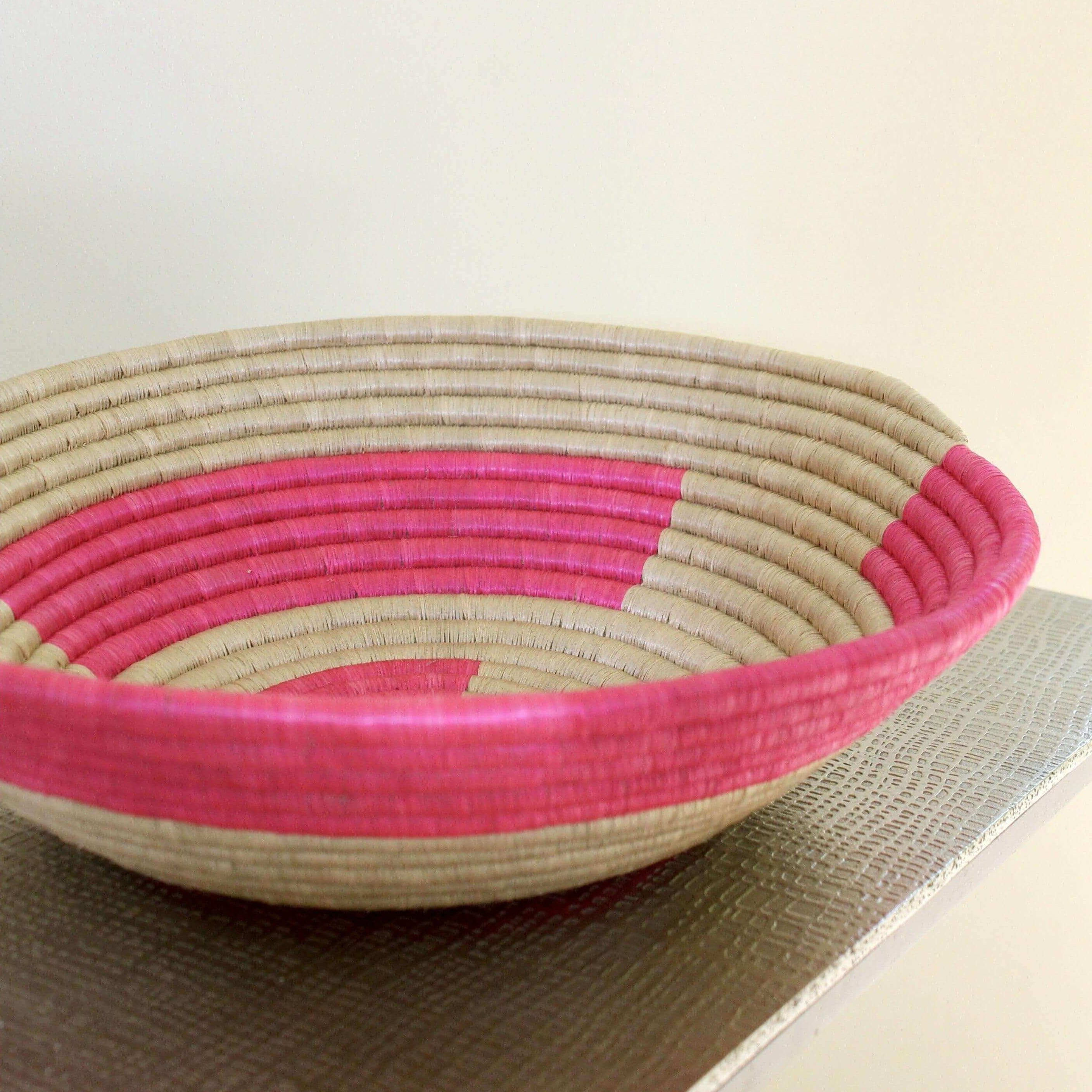 Pink seagrass basket bowl from Rwanda