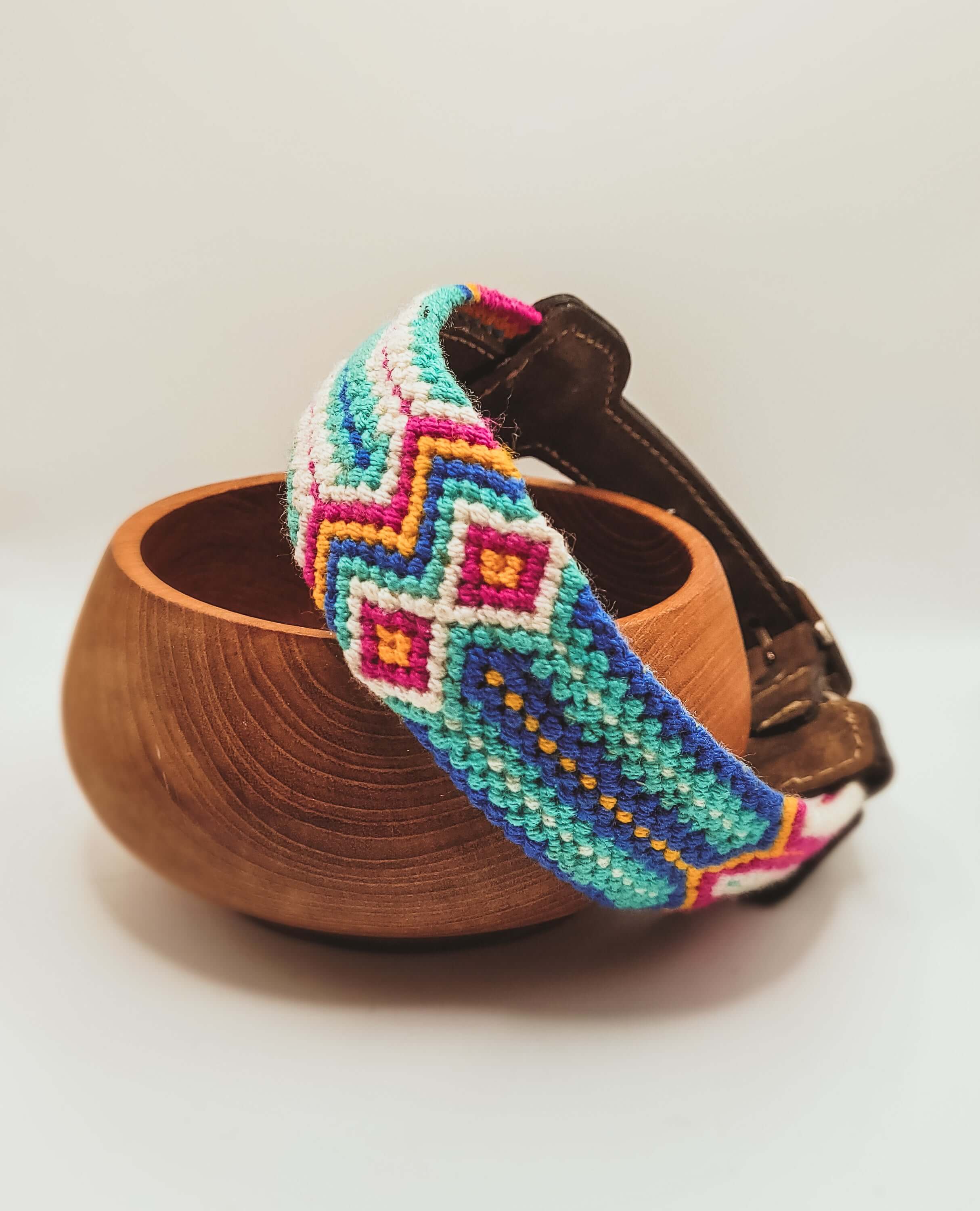 Blue and pink woven dog collar handcrafted by Wayuu artisans