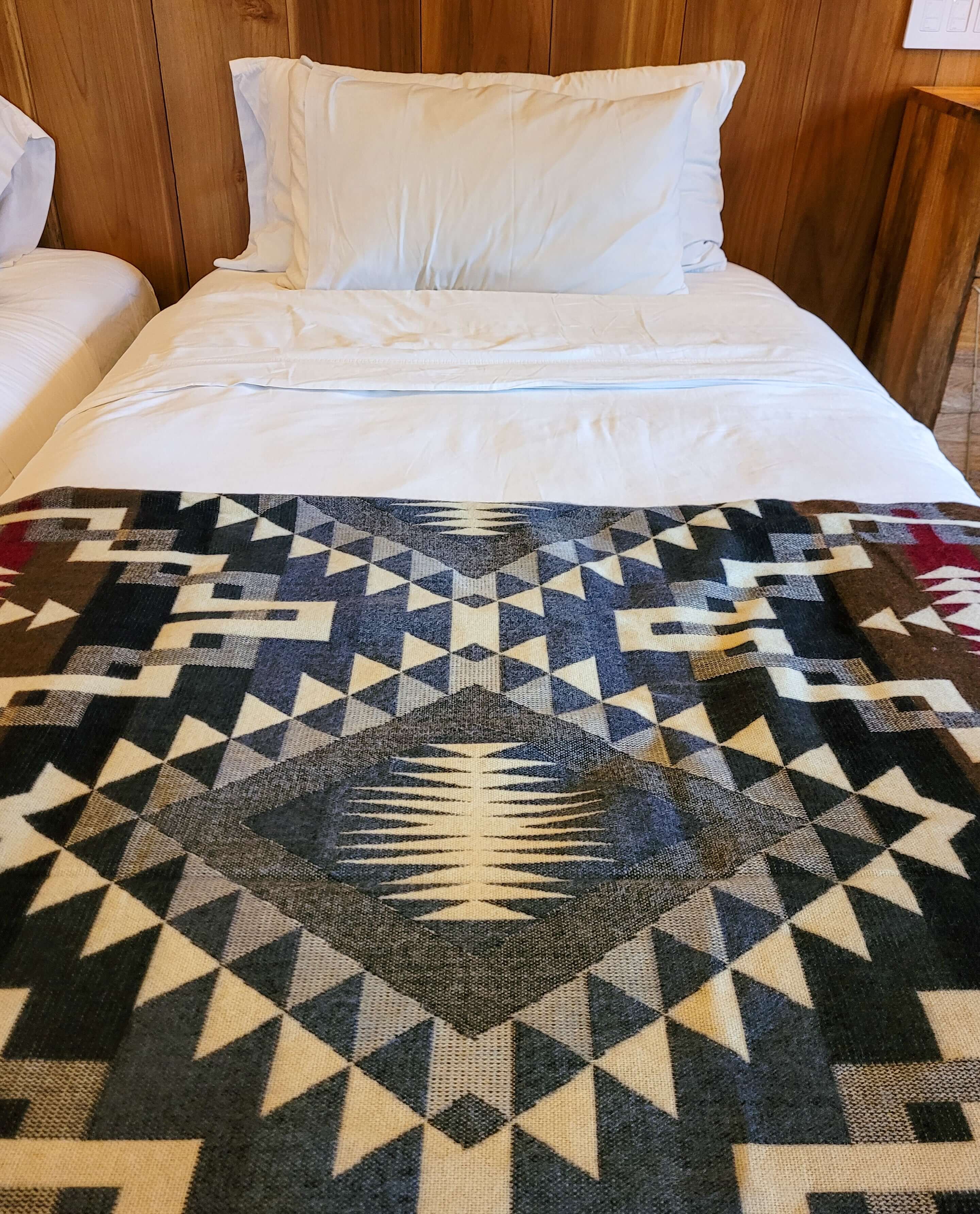 Andean Boho Blanket Grey On Bed
