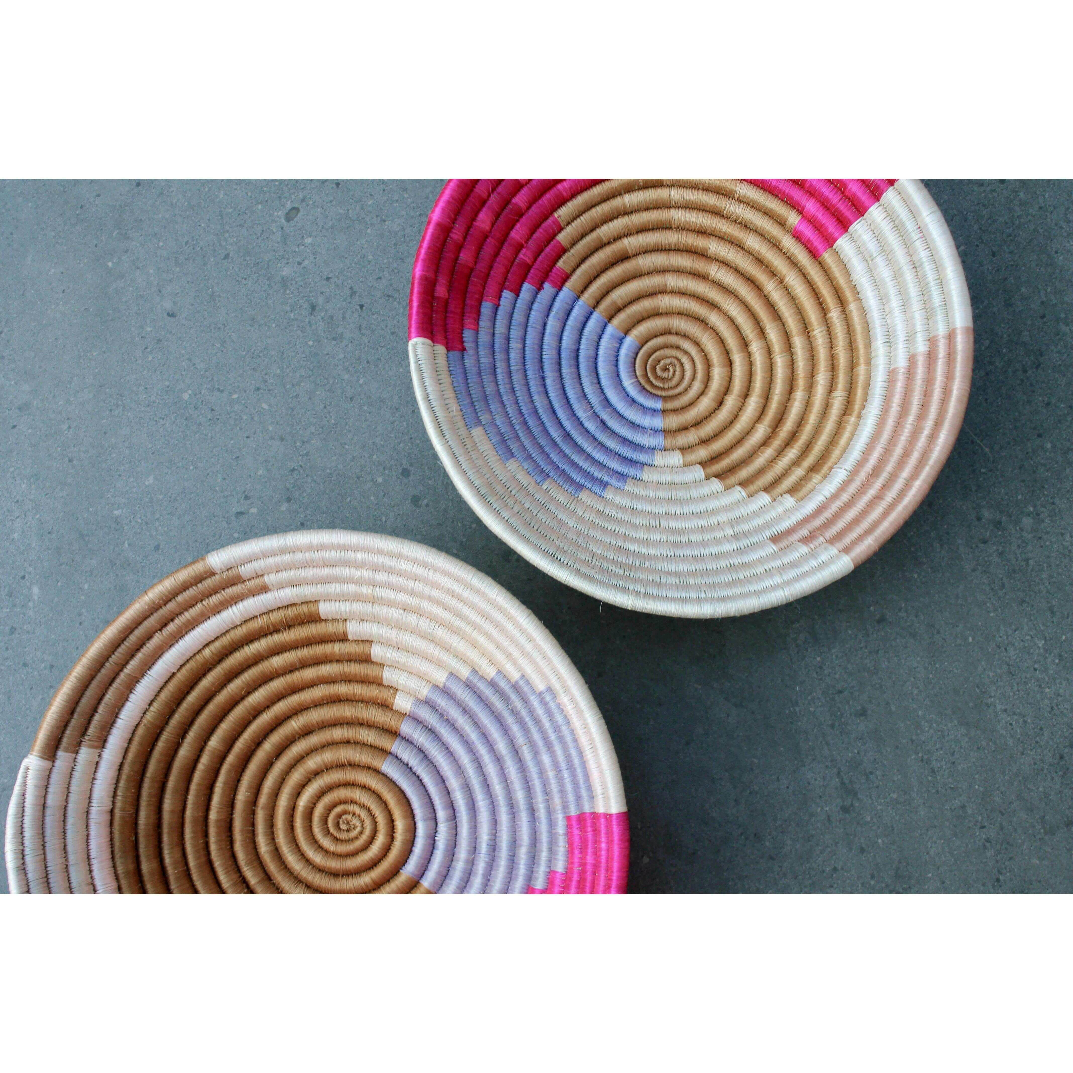 Colourful seagrass basket bowls made by Rwandan artisans