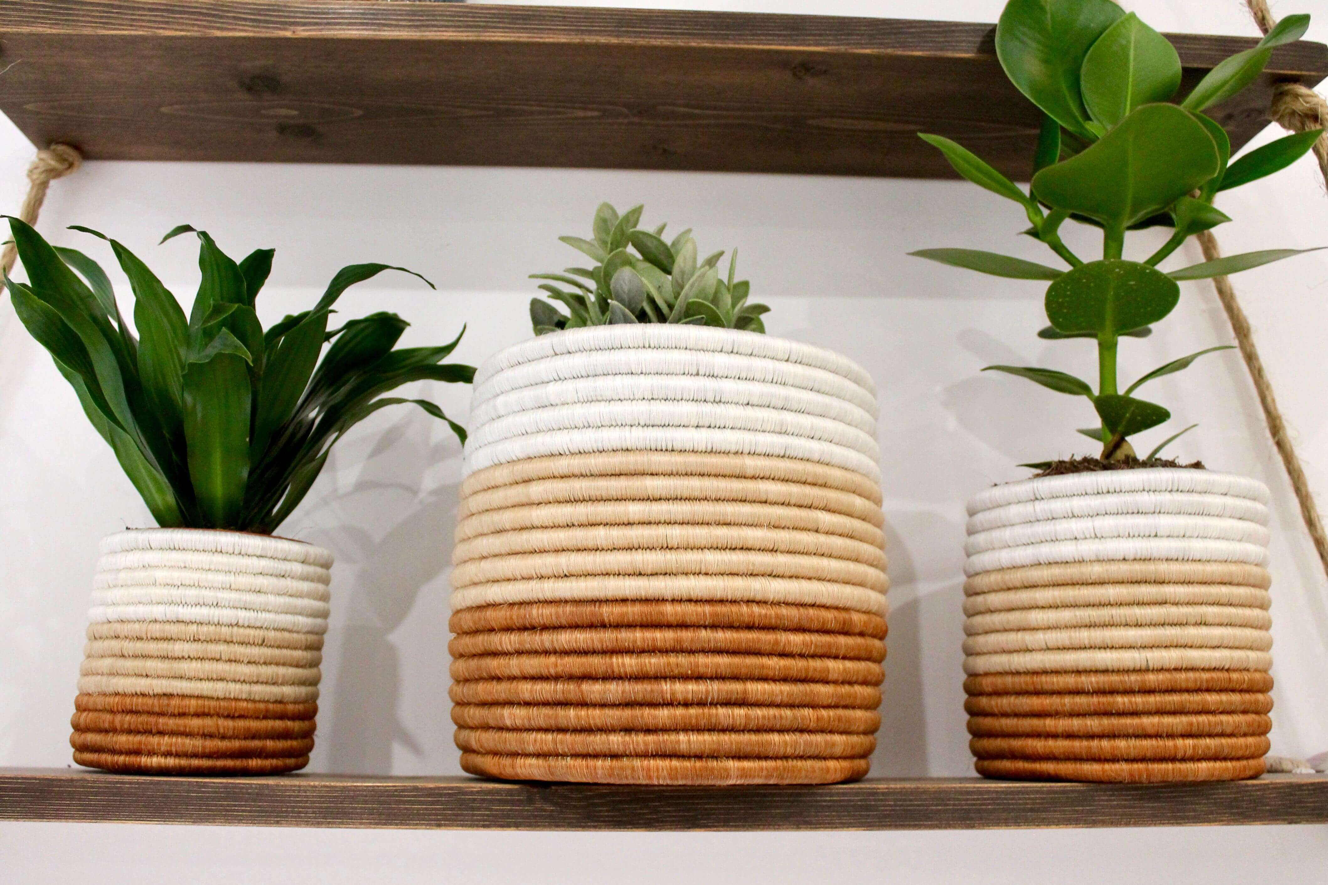 Set of 3 handwoven African plant pots rust and white coloured